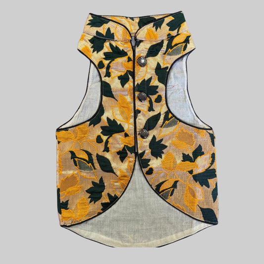 Dog wearing yellow sherwani with dark green leaf embroidery, perfect for Haldi ceremonies and Indian festive celebrations