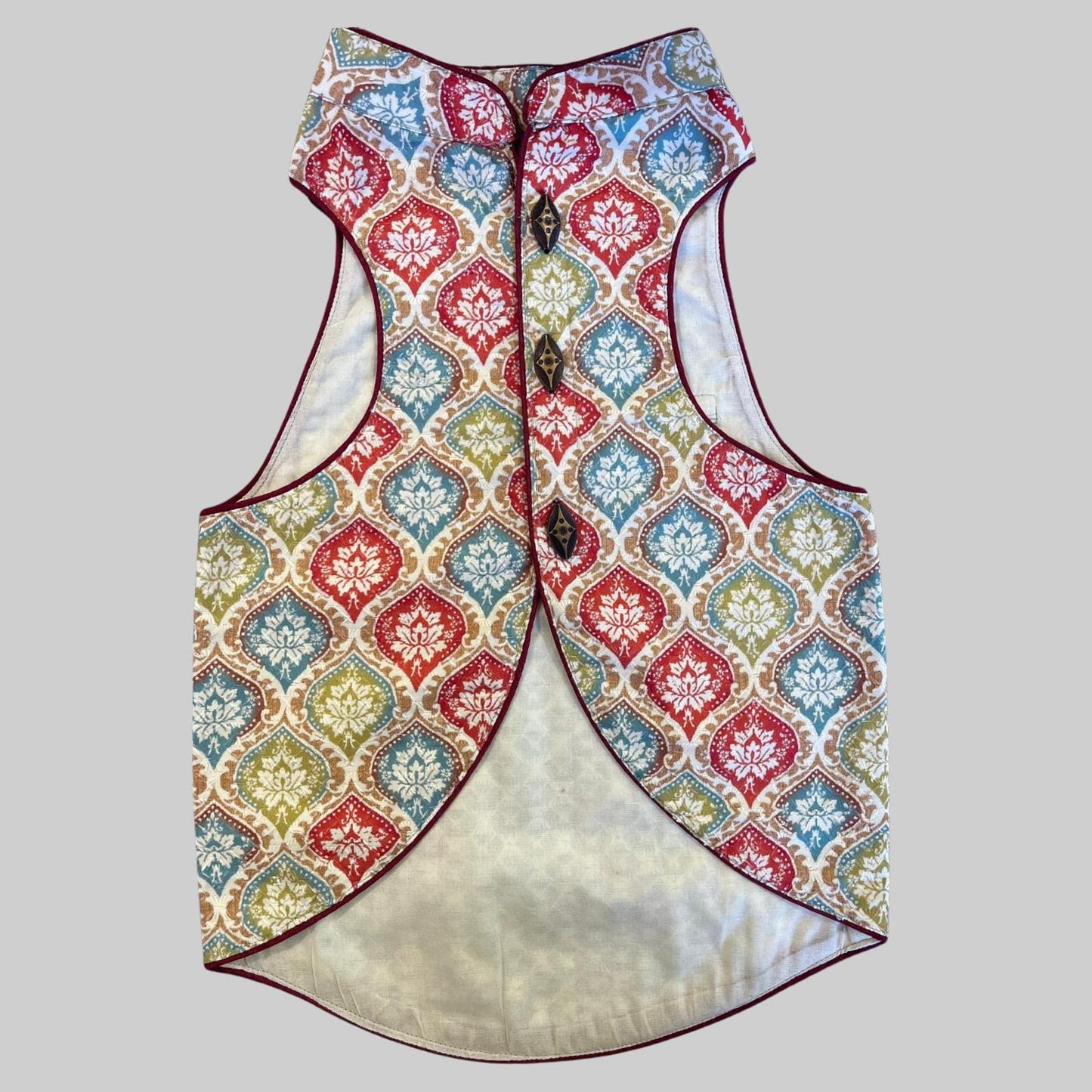Dog wearing sherwani with traditional patola-inspired print, perfect for Indian weddings and festive garba events